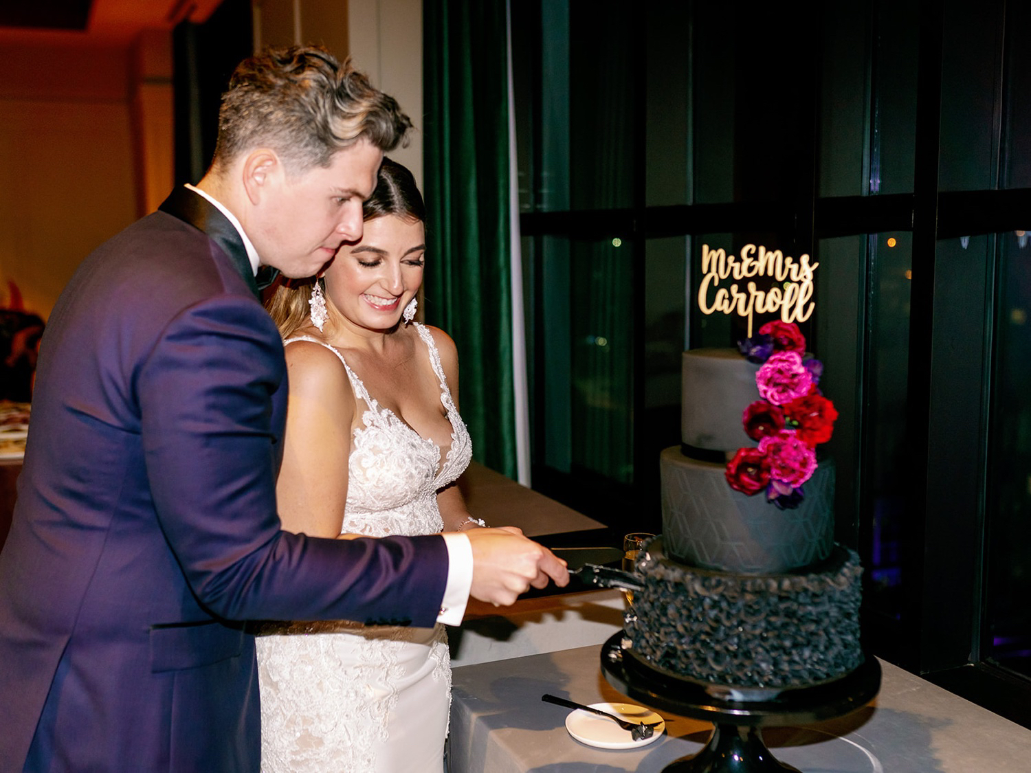 cutting a wedding cake