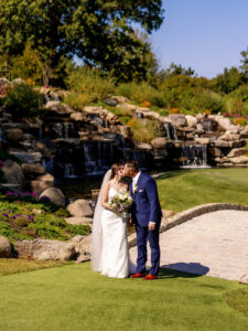 bride and groom kissing at the garden for the garden wedding photography