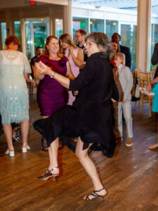 a woman dancing freely captured a documentary wedding photography style